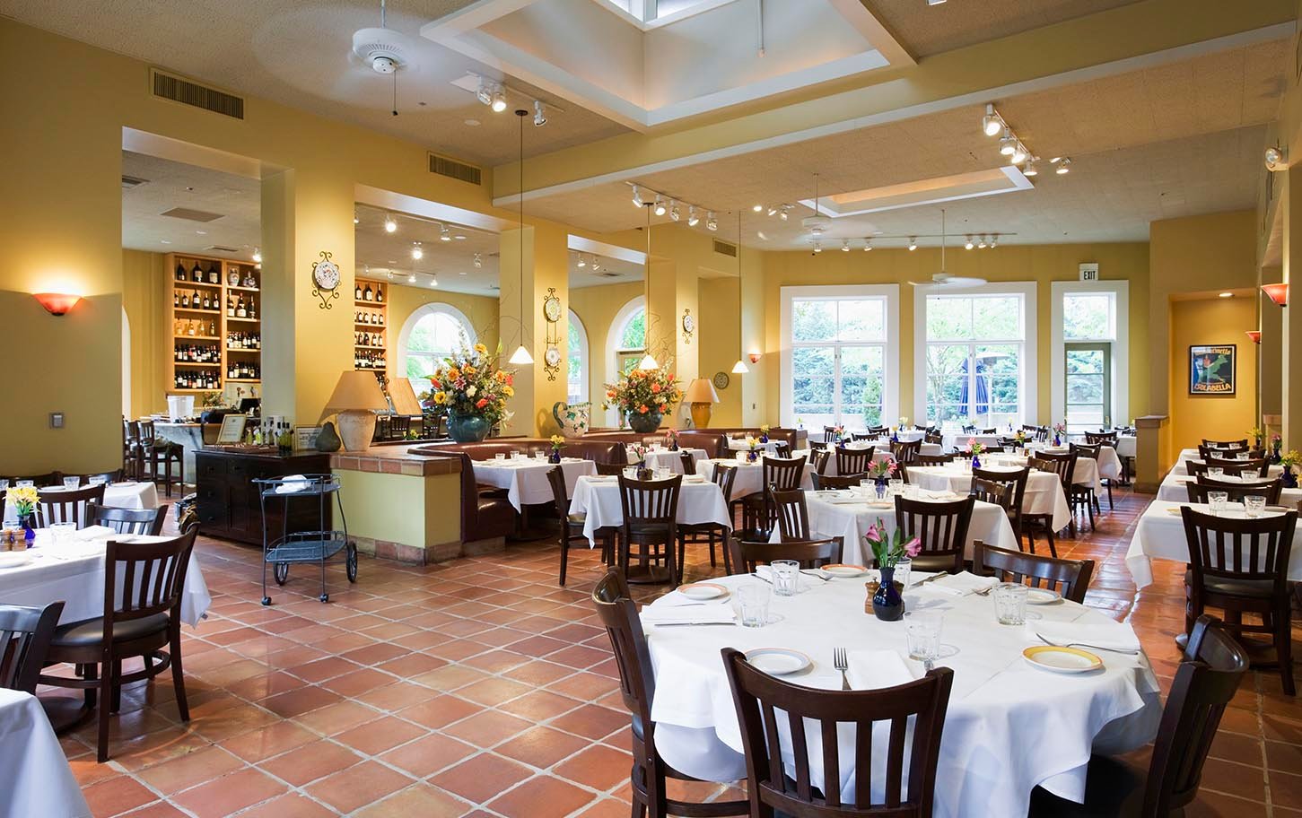 Elegant fine dining restaurant seating at Golden Key Hotel.